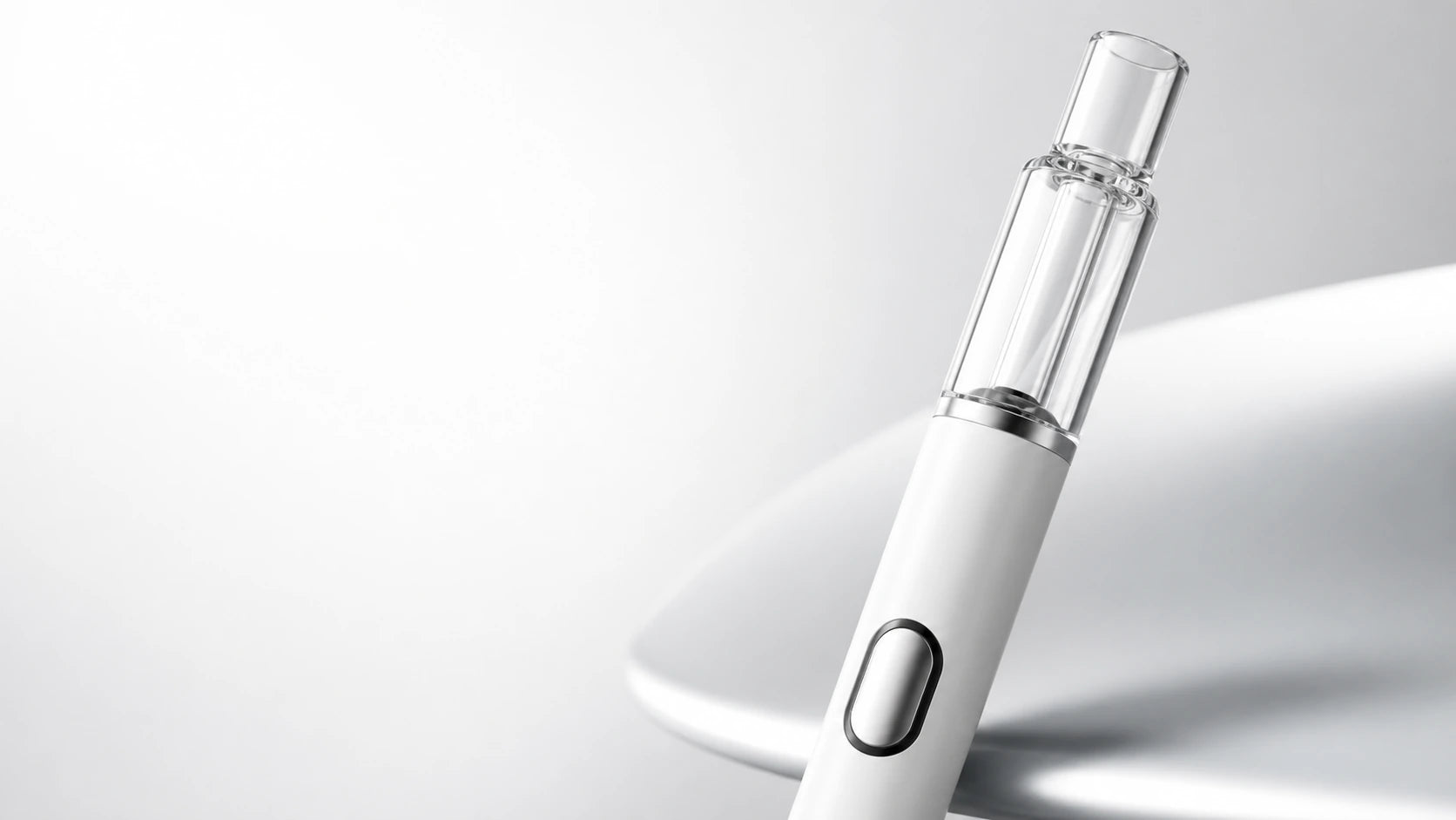 Briar empty disposable vape pen hardware on a warm product stage