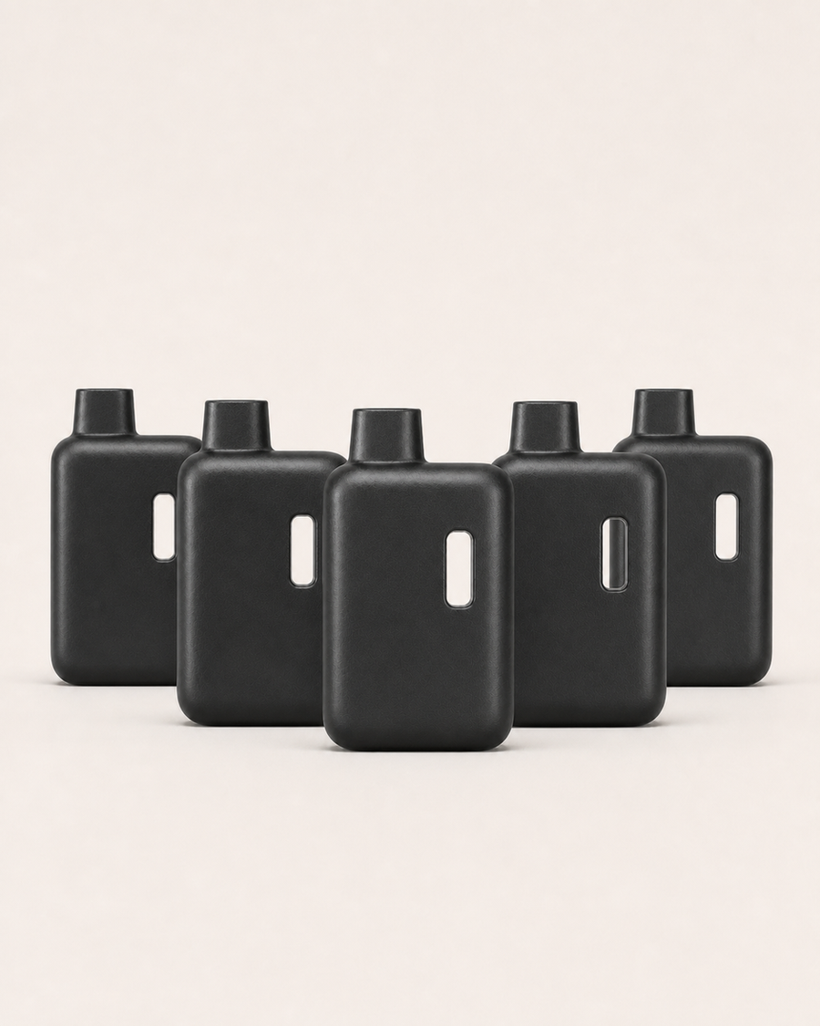 Nook compact matte-black 2mL empty disposable vape hardware — five-piece sample arrangement