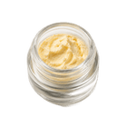 Budder cannabis concentrate in a glass jar for concentrate hardware use cases